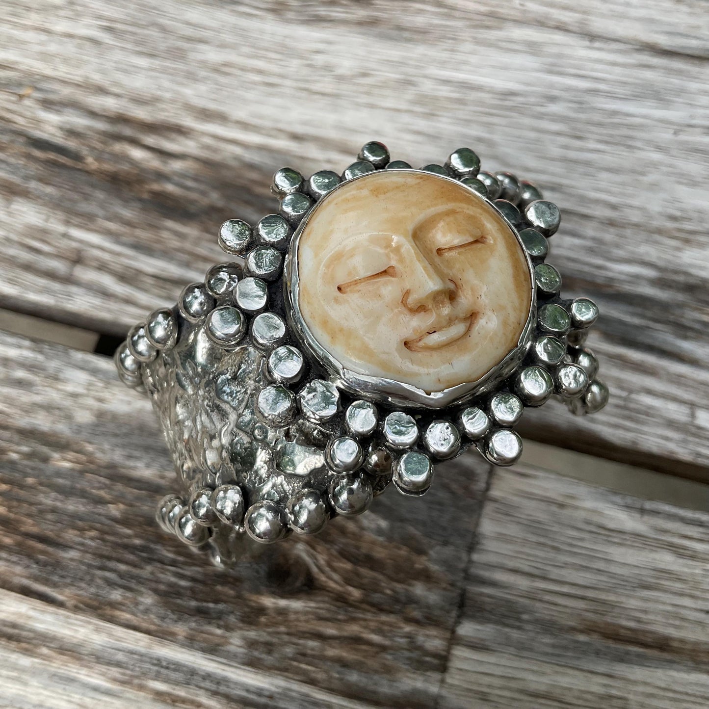 Sterling silver brutalist carved face sunburst cuff bracelet Colors Of Etnika