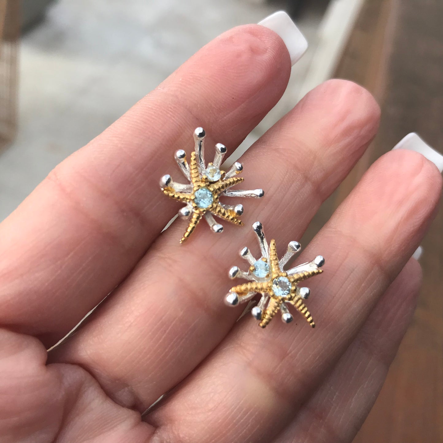 Sterling Silver natural blue topaz starfish stud earrings