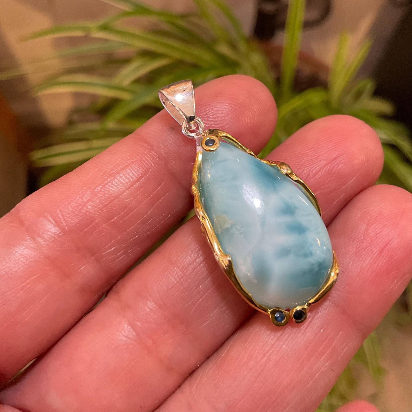 Sterling silver blue Dominican Larimar pendant with sapphire