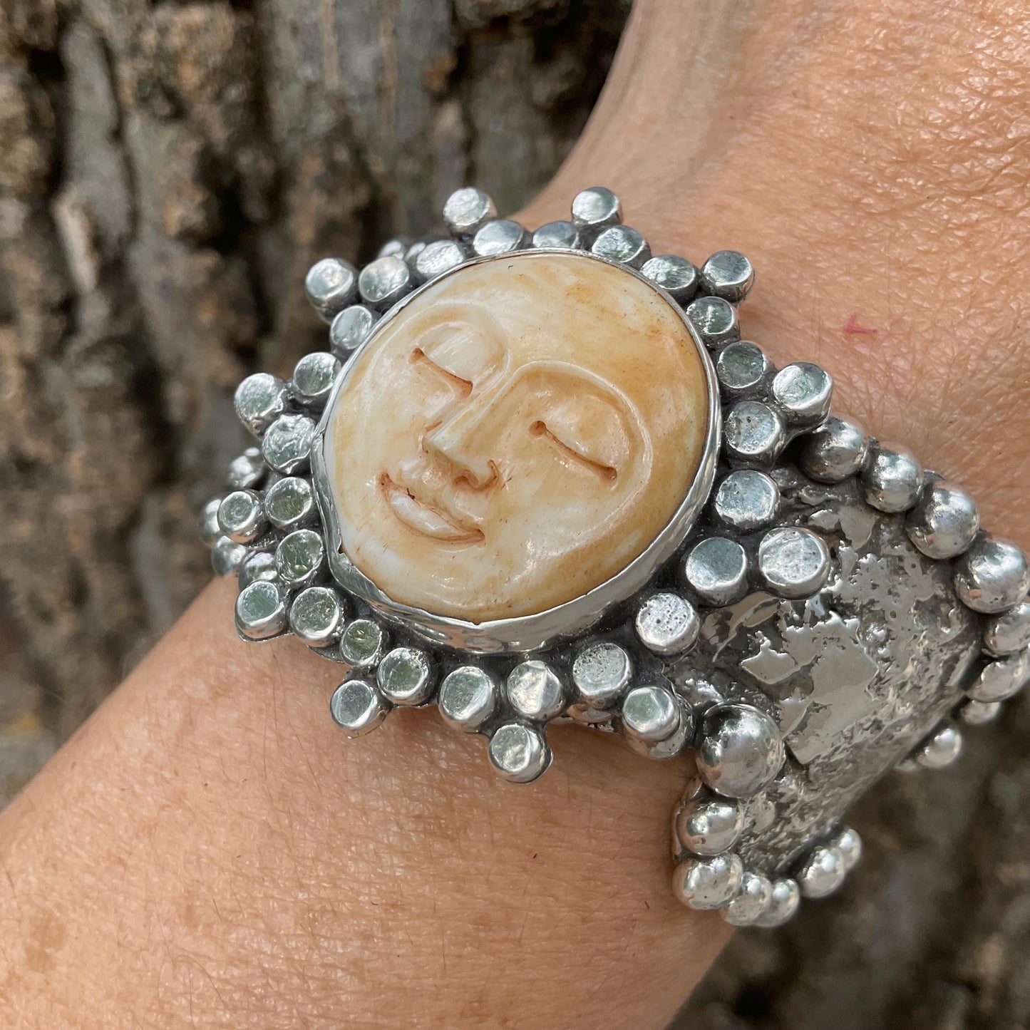 Sterling silver brutalist carved face sunburst cuff bracelet Colors Of Etnika
