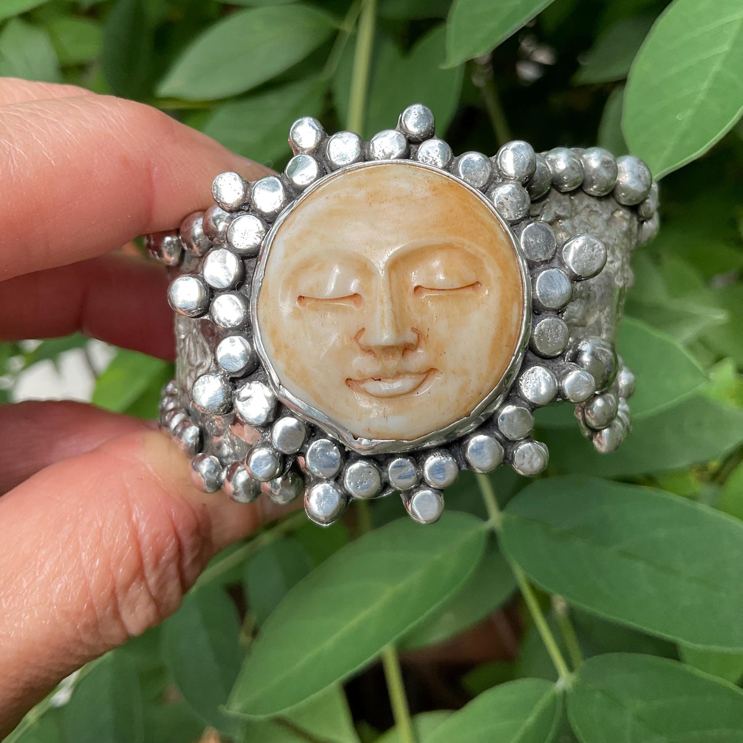Sterling silver brutalist carved face sunburst cuff bracelet Colors Of Etnika