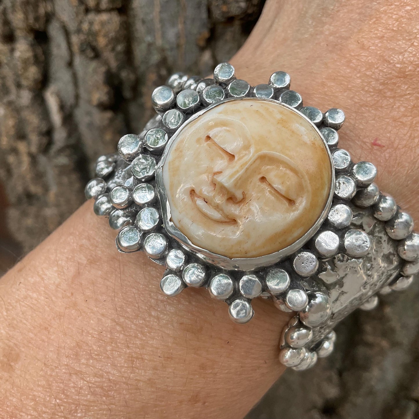Sterling silver brutalist carved face sunburst cuff bracelet Colors Of Etnika