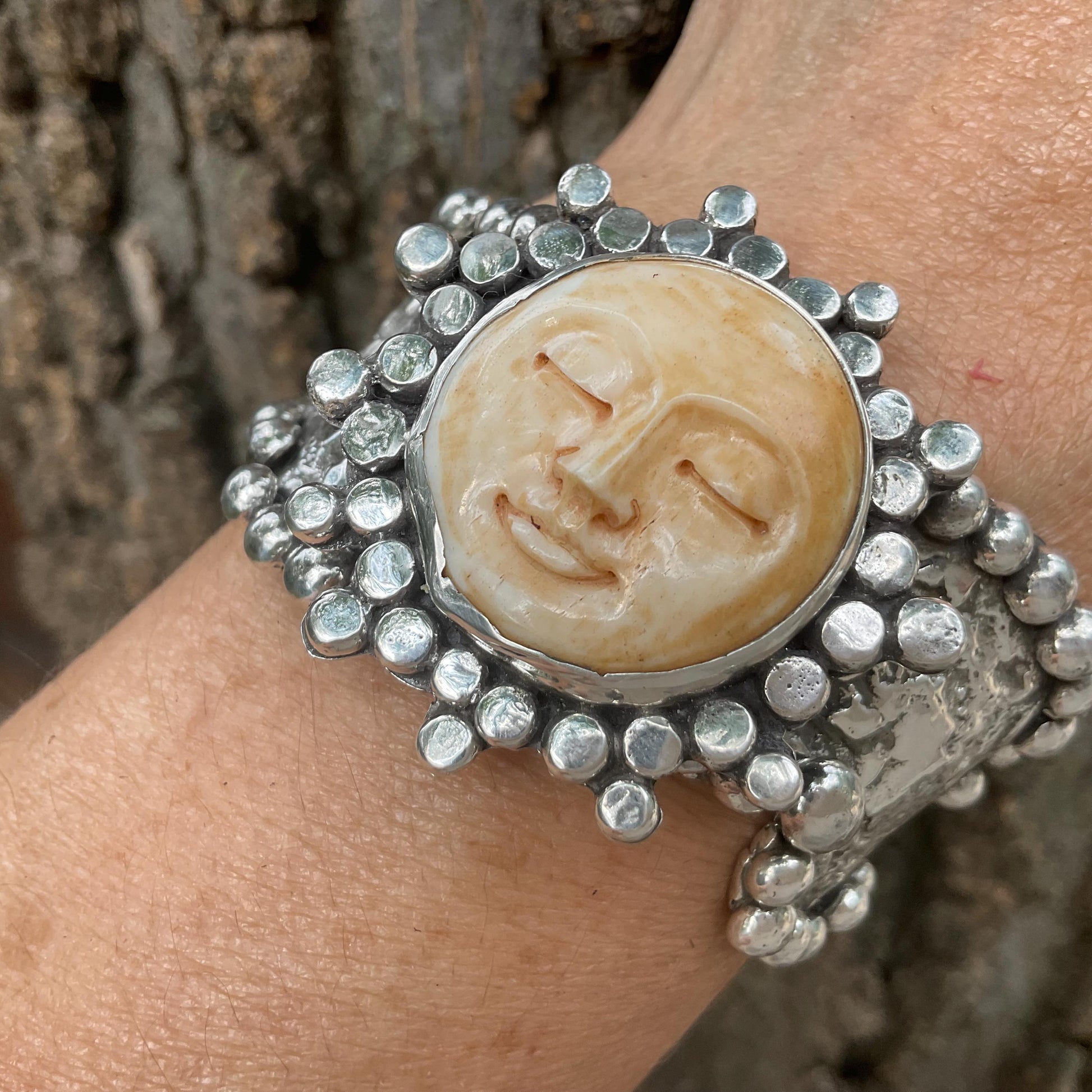 Sterling silver brutalist carved face sunburst cuff bracelet Colors Of Etnika
