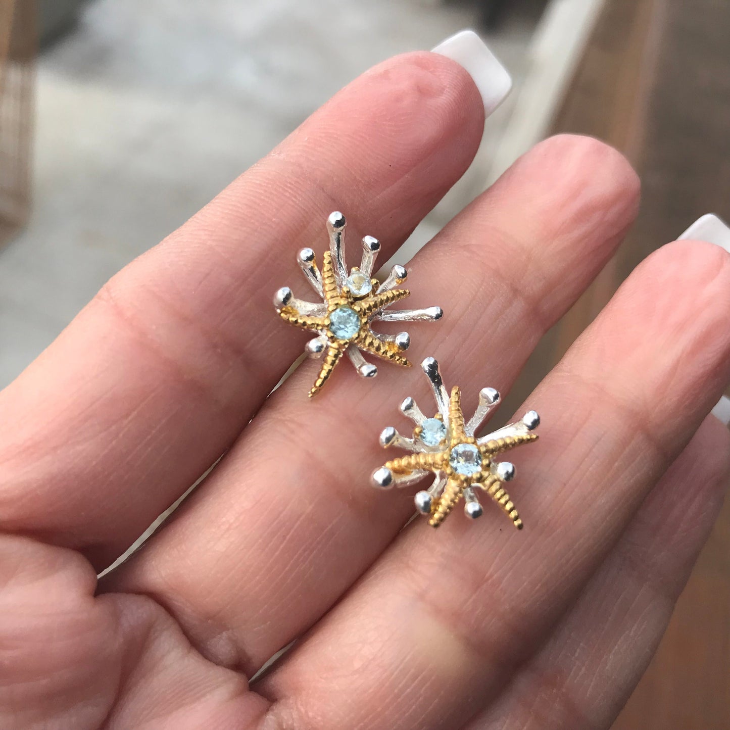 Sterling Silver natural blue topaz starfish stud earrings